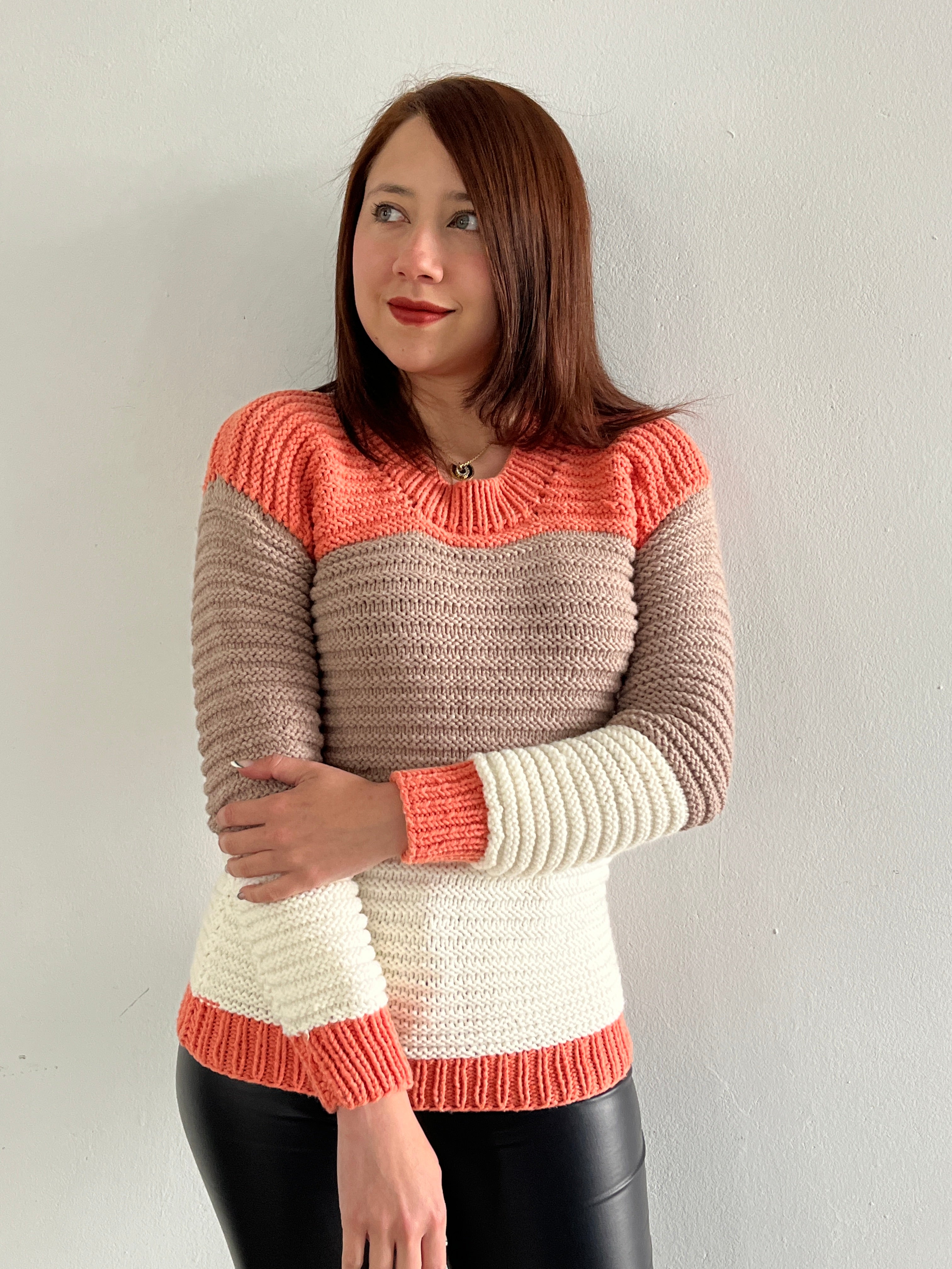 Hand-knitted cotton sweater – round neck with coral, beige, and cream stripes